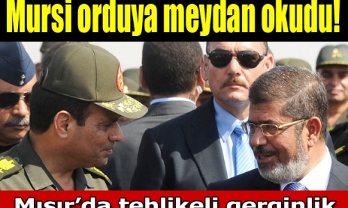 Mursi darbeye meydan okudu: Görevimin başındayım